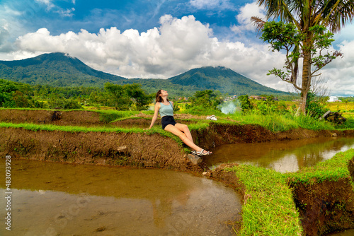 Tourist woman resting on Jatiluwih rice terrases