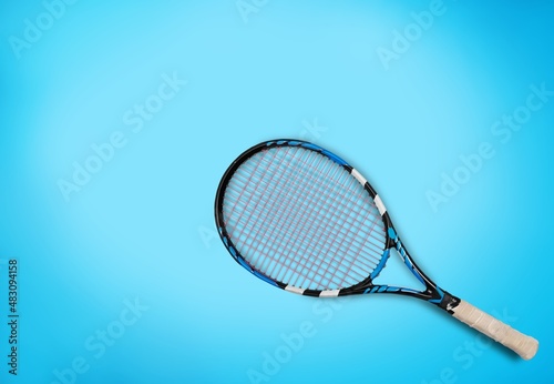 New professional tennis racket on background. sports theme © BillionPhotos.com
