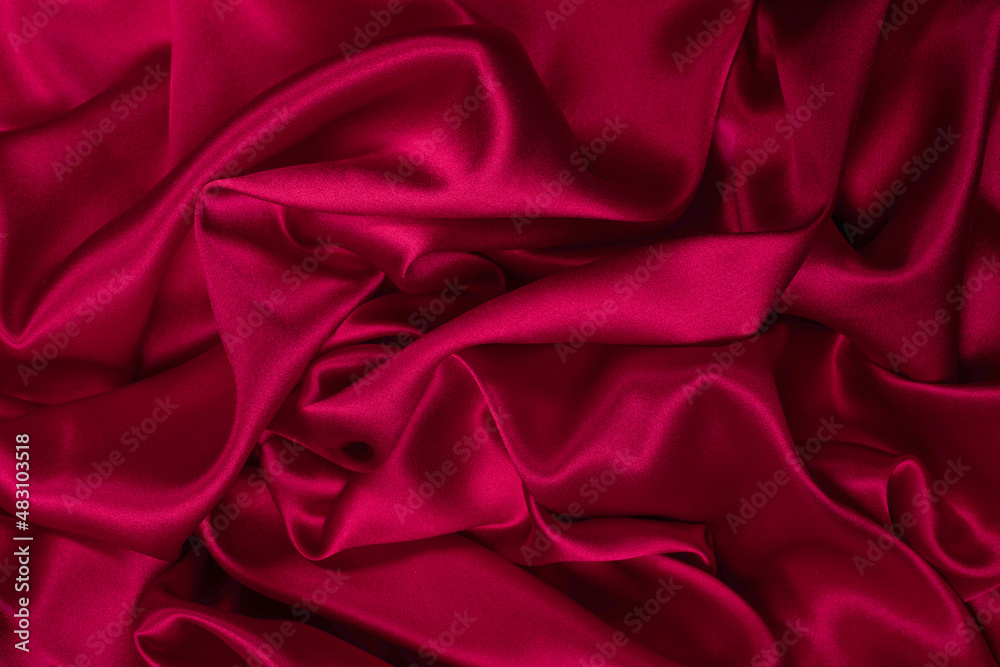 Rich and luxury red silk fabric texture background. Rich and luxury red silk fabric texture background.