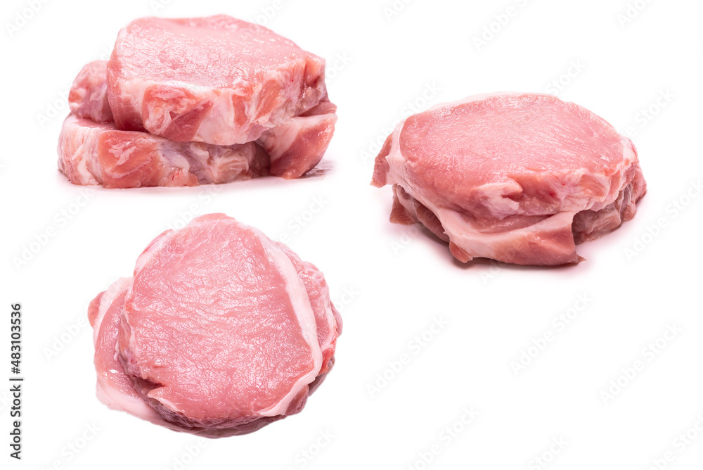 Raw pork pieces isolated on a white background. Raw pork pieces isolated on a white background.