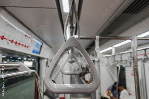 Safety loops on electric trains for passengers hold when stand