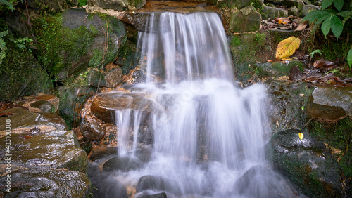 Fototapeta Naklejka Na Ścianę i Meble -  small fresh and cool waterfall