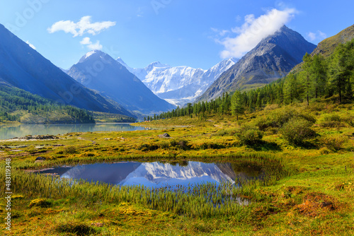 Fototapeta Naklejka Na Ścianę i Meble -  mountain landscape with a lake and the reflection of snow peaks in the water in the valley of the Ak-Kem River of the Altai Mountains with the sacred Belukha Mountain