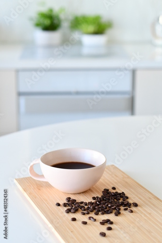 Black coffee in a white mug, Coffee beans