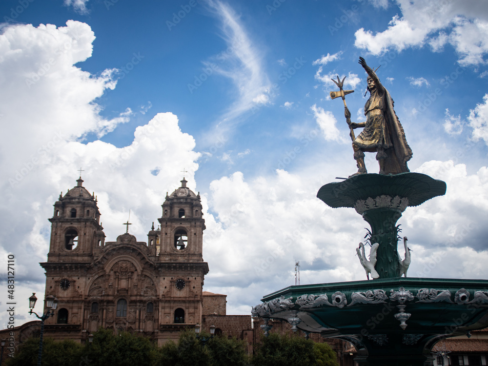 Fototapeta premium Inca statue and the church