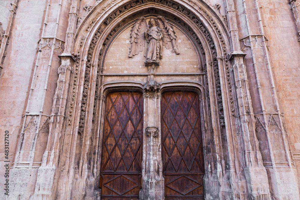 Antique passage with doors in an old building in the Cathedral.