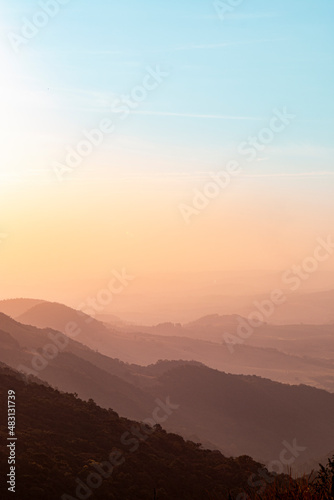 Pico do Gavi  o  Andradas  Minas Gerais  Brazil  sunset at the top of mantiqueira mountain with paraglaider flight