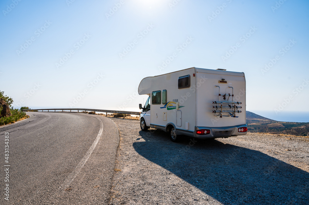 Motorhome RV parked on the side of the road, Crete, Greece.