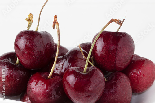 Fresh cherries isolated on white background.