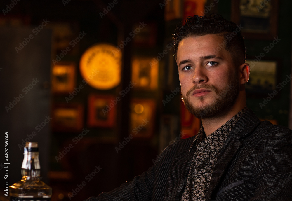 elegant man at a pub bar elegant man at a pub bar