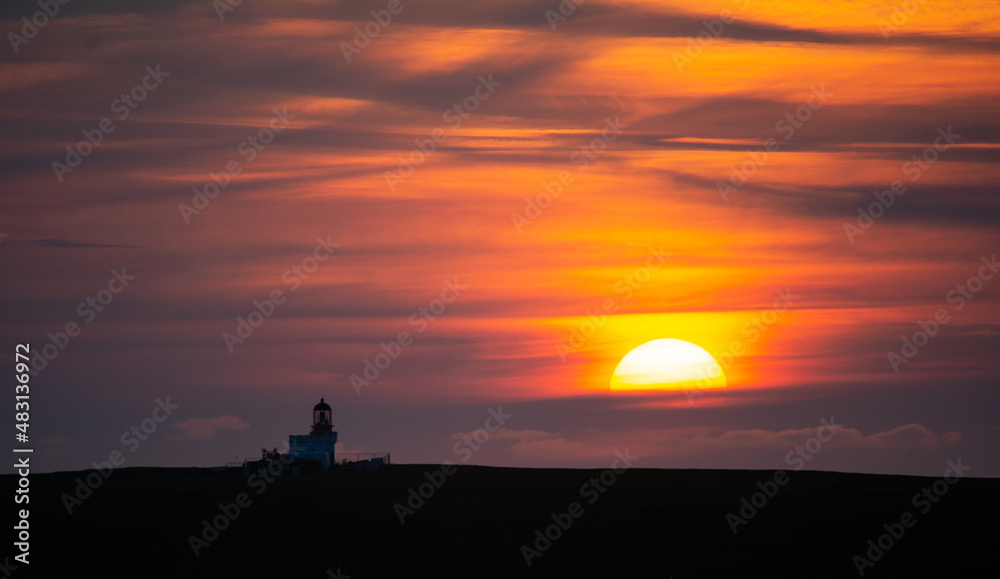 Brough of Birsay Lighthouse at Sunset, Island of Orkney, Scotland 