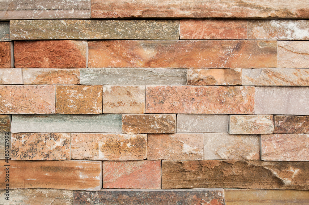 Grunge brown ,beige,orange,grey stone wall tiles texture backdrop.Wall natural brown stone dirty,dust.Wall and panel marble natural pattern for architecture and interior design or abstract background Grunge brown ,beige,orange,grey stone wall tiles texture backdrop.Wall natural brown stone dirty,dust.Wall and panel marble natural pattern for architecture and interior design or abstract background