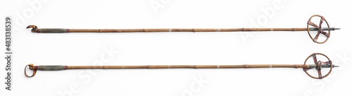 vintage bamboo ski poles isolated on white background