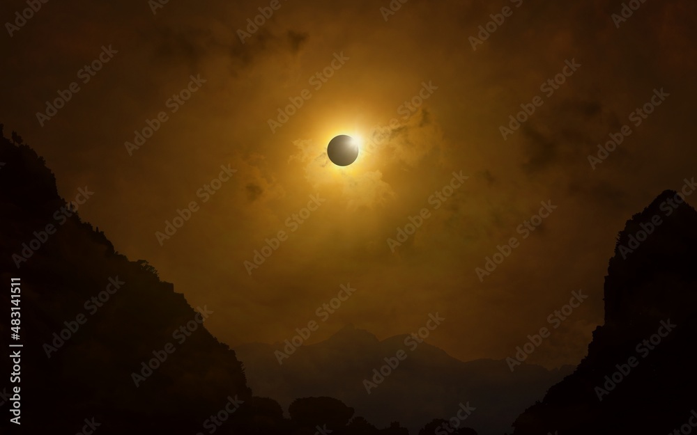Total solar eclipse in dark red sky above mountains, mysterious phenomenon when Moon passes between planet Earth and Sun