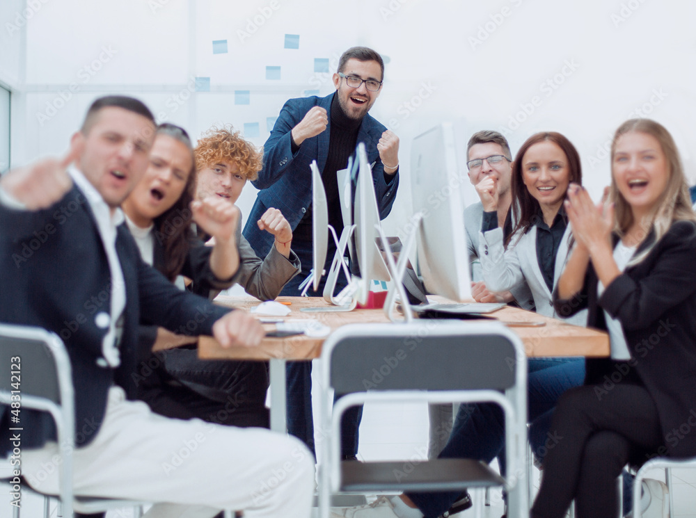 large group of happy employees sitting in conference room. large group of happy employees sitting in conference room.
