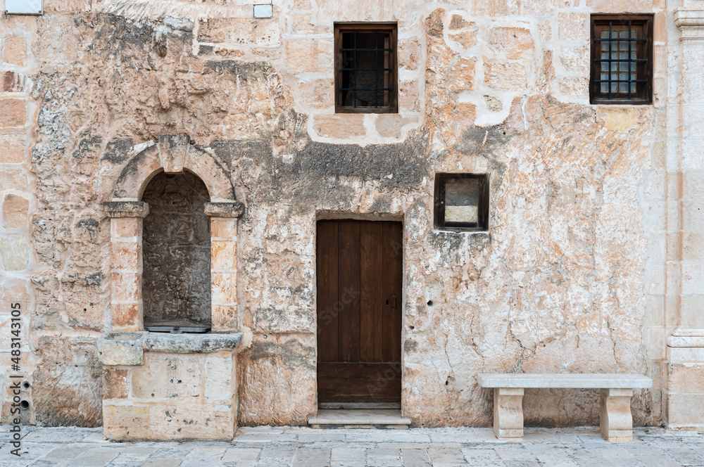 Mellieha, Malta - 01 07 2022:  Worn traditional facade of a residential house