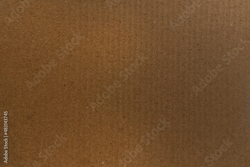 Kraft paper texture. Vintage torn brown sheet of paper. Copy space