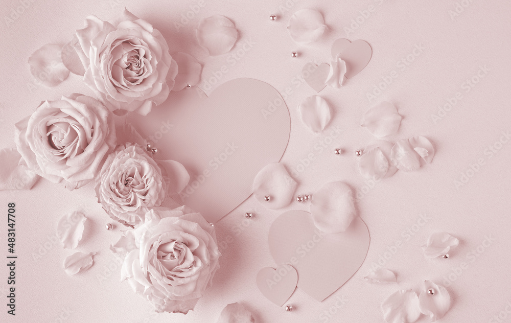 Valentine's Day toning background. Creative layout with pink flowers, paper heart over punchy pastel background. Wedding concept. Present for Woman day. Valentines day concept. Flat lay, top view, cop