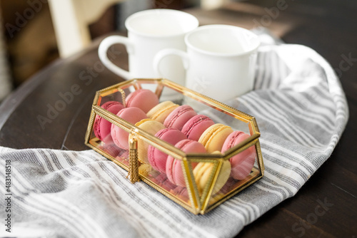 Pink French Macarons in Gold and Glass Box, Valentine's Day Dessert, Fancy Dessert, White Coffee Cups, Copy Space
