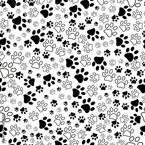 Black and white paw prints seamless fabric textile design pattern