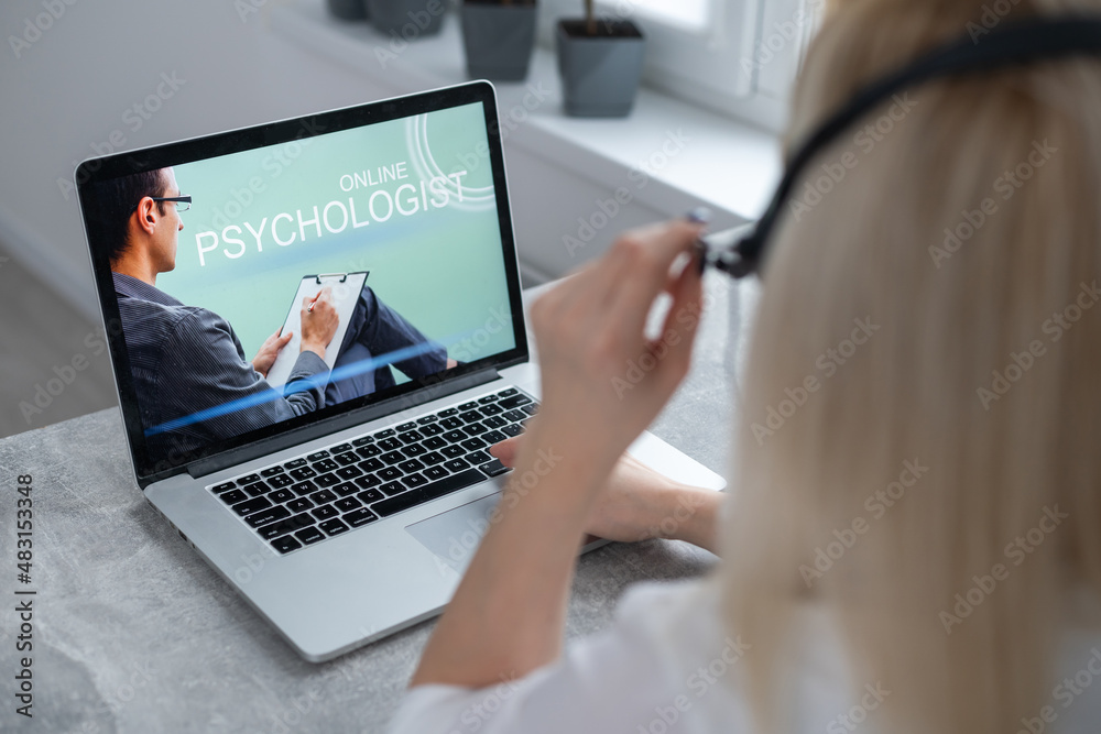 Psychological consultation online - man lists his problems - communicates with the patient using the digital technology - remote psychodiagnosis session Psychological consultation online - man lists his problems - communicates with the patient using the digital technology - remote psychodiagnosis session
