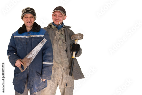 Two bad unskilled builder workers in bad dirty tattered uniform with bad tools. Concept of unskilled workers or crooks or poor quality workers