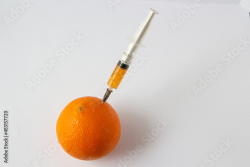 syringe with orange