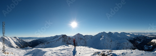 Winter mountain landscape / Climber on the top / Trekking winter © Mariusz