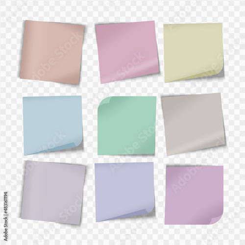 Colored sheets of note papers with curled corner and push pin