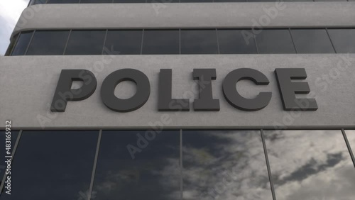 Police station sign establishing exterior building. Police building