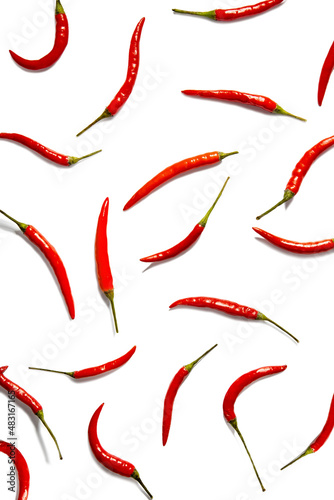 Red chilli peppers top view,pattern.picy food background for design.