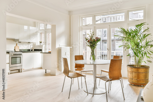 Dining room interior in modern urban appartment photo