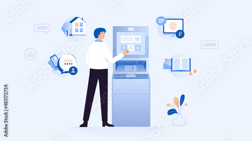 Man performing financial transactions at ATM