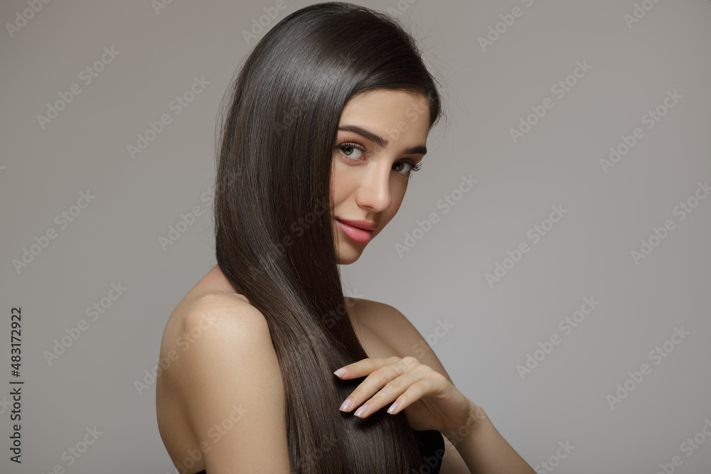 Naklejka premium Beautiful woman with shiny hair