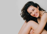 Beautiful laughing young woman with fresh clean skin