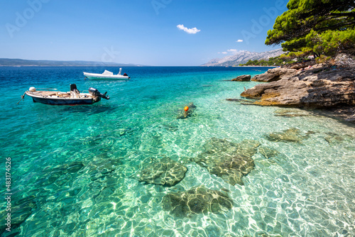 Obraz na płótnie crystal clear water in adriatic sea in Brela on Makarska riviera in Dalmatia region in Croatia w salonie