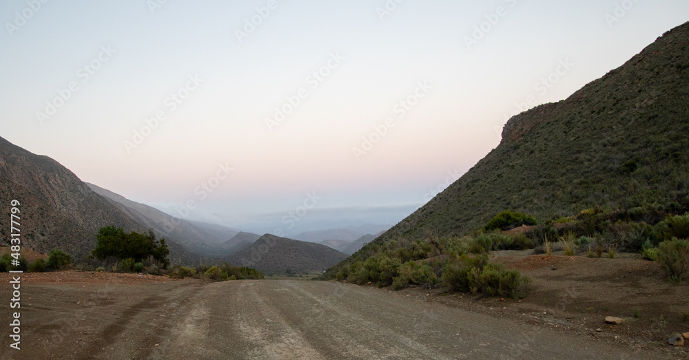A valley of hills fade into the sunrise in Vleiland in the Central Karoo in the Western Cape province of South Africa