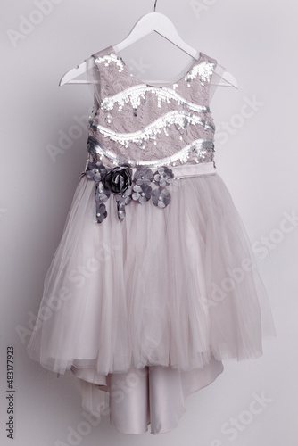 Dress for a girl - festive outfit on a hanger, ball gown for children