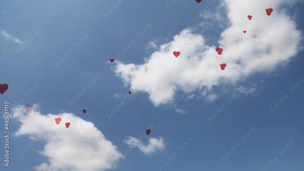 Red flying hearts in the blue sunny sky with clouds time lapse valentine's day concept love amour animation background. Red flying hearts in the blue sunny sky with clouds time lapse valentine's day concept love amour animation background.