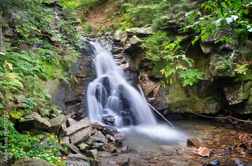 Fototapeta Naklejka Na Ścianę i Meble -  Water pouring down the Kaskady Rodła (Rodła Waterfalls) on the slopes of Mt Barania Góra, Silesian Beskids, Poland