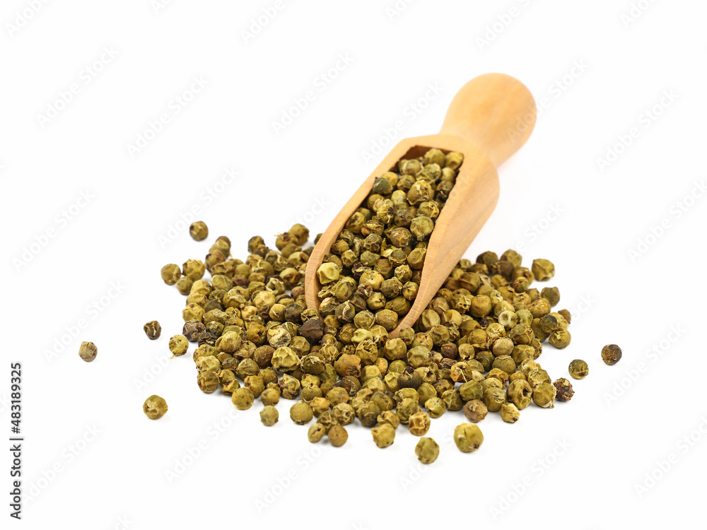 Wooden scoop full of green peppercorns Wooden scoop full of green peppercorns