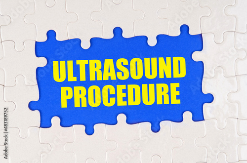 Inside the white puzzles on a blue background it is written - Ultrasound procedure