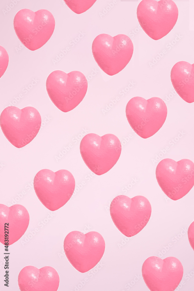 Pink heart levitating with pink background