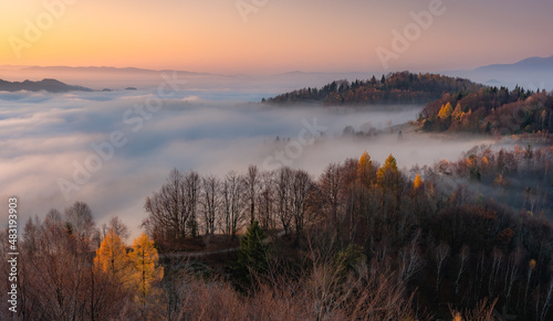 Misty autumn mountains landscape in the morning, Poland, Beskidy mountains
