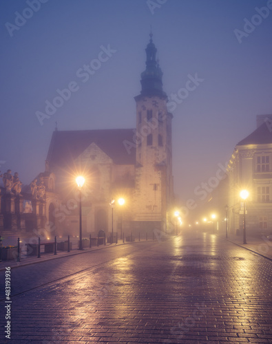 Krakow old town, St Andrew church on Grodzka street in the foggy night
