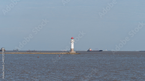 Beautiful white lighthouse at the entrance of Yangtze river.