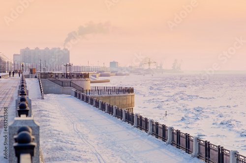 Red sunrise. View of the snow-covered embankment of the Amur River in winter. Early morning. © Алексей Игнатов