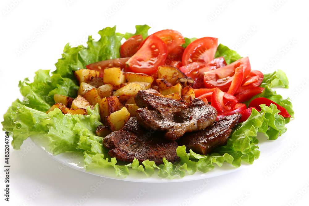 Meat plate with potatoes and souce