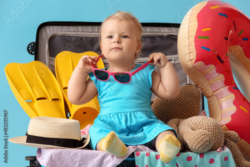 Adorable baby girl in big s...