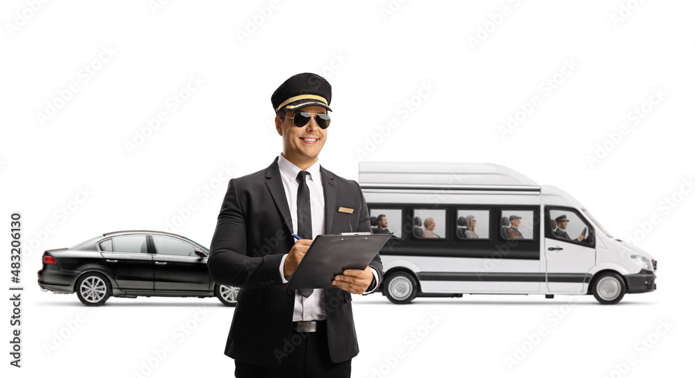 Chauffeur with a clipboard standing in front of a mini bus shuttel and a black car